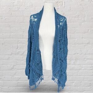 handmade blue crochet cardigan with tassels and boho design